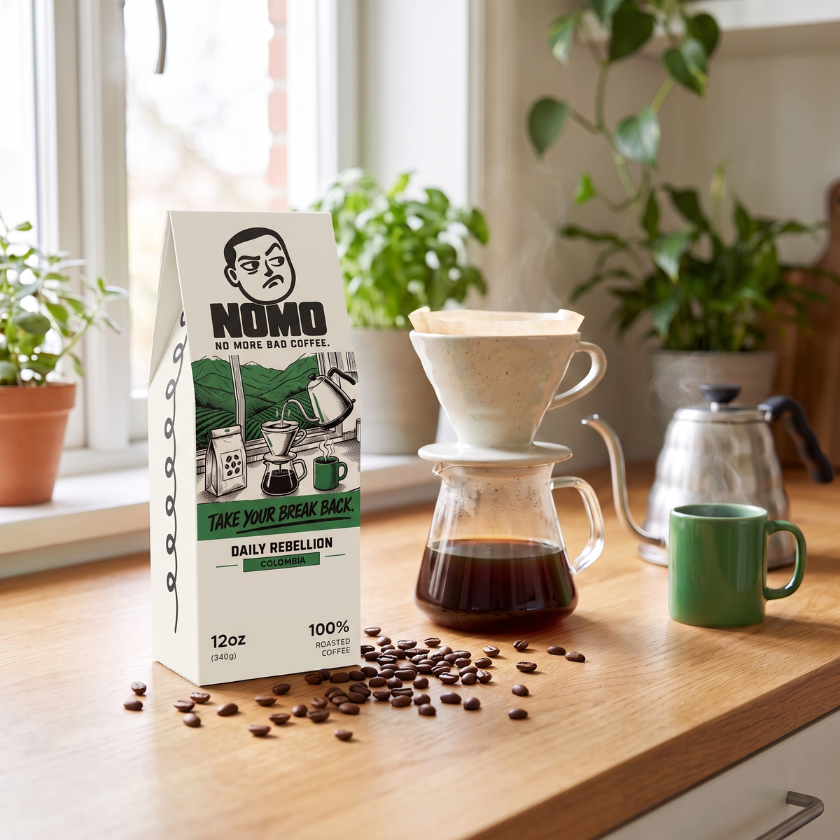 NOMO Colombia coffee next to a pour-over setup on a kitchen counter