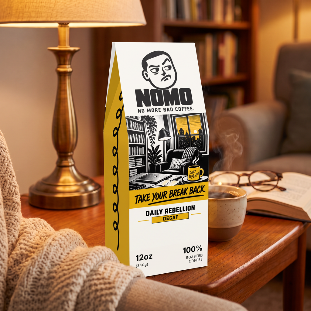 NOMO Decaf on a cozy side table with a book
